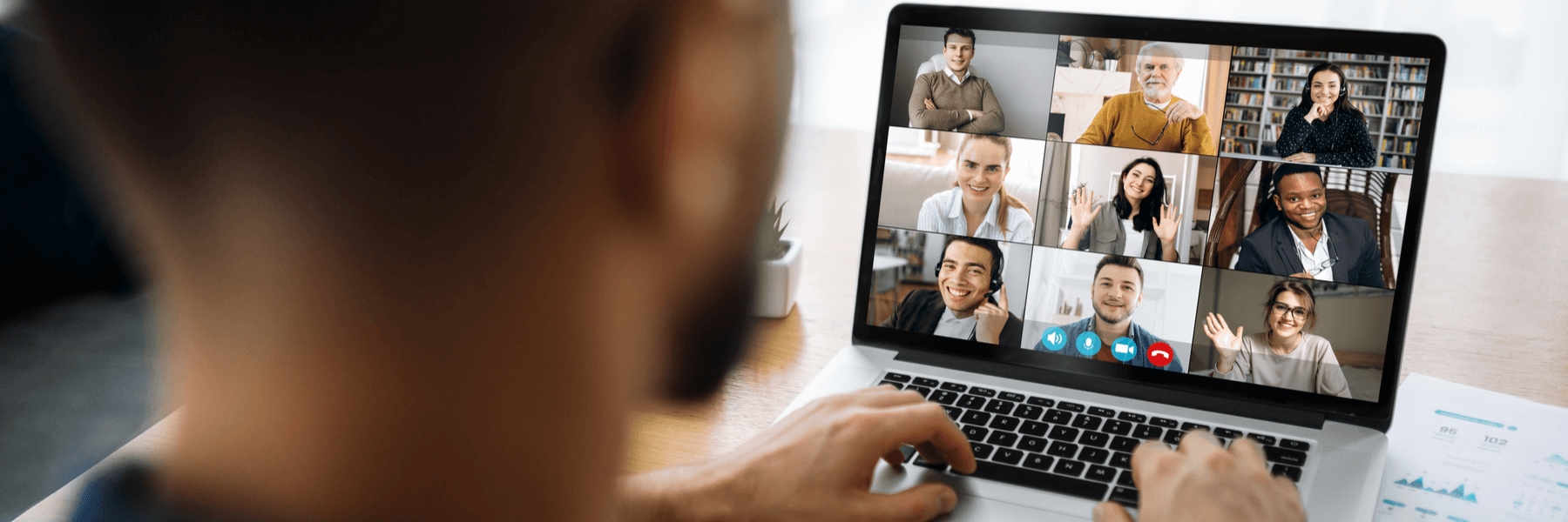 Remote worker on Zoom or digital video meeting with coworkers.