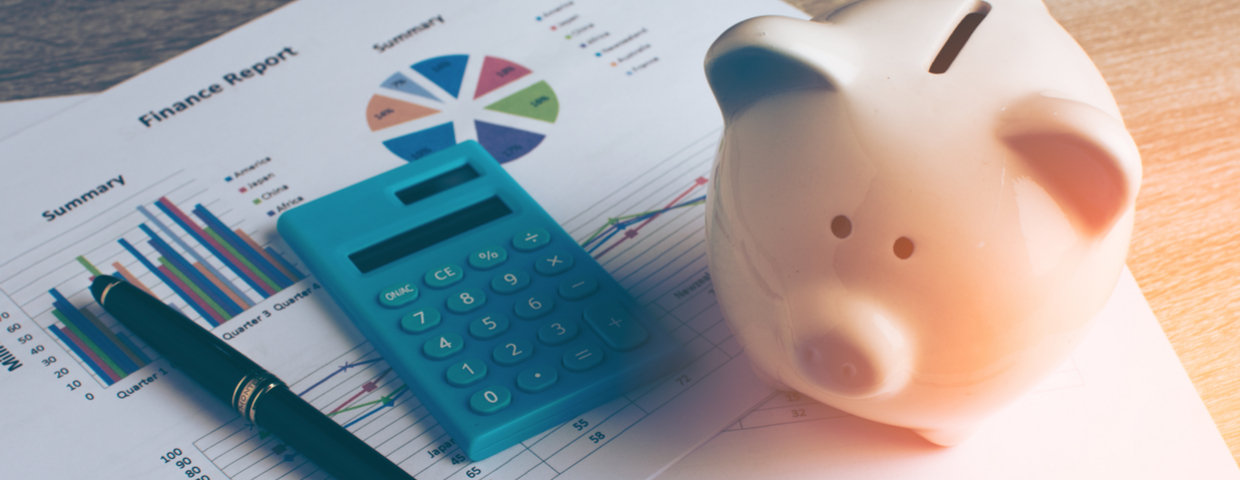 savings piggy bank and calculator 
