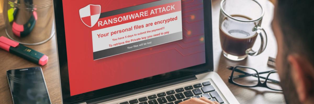Ransomware alert message on a laptop screen